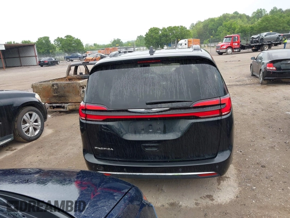 2022 Chrysler Pacifica Touring L with VIN 2C4RC1BG3NR106311, listed as a IAAI auction lot 42158651 with 68,473 mi miles and . Bid and sale history available at DreamBid. Image 17.