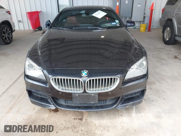 2012 BMW 6 Series 650i z VIN WBALX3C51CDV77602, wystawiony jako IAAI lot #41668235 z przebiegiem 103 684 mil mil oraz . Historia ofert i sprzedaży dostępna na DreamBid. Obrazek 6.