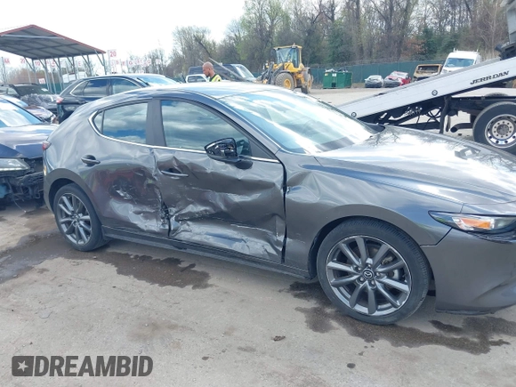 2020 Mazda 3 Preferred with VIN JM1BPBMM1L1169228, listed as a IAAI auction lot 41930452 with 31,351 mi miles and . Bid and sale history available at DreamBid. Image 6.