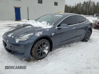 2019 Tesla Model 3 Mid Range with VIN 5YJ3E1EA1KF528950, listed as a Copart auction lot 43344475 with 57,272 mi miles and Clean Title. Bid and sale history available at DreamBid. Image 1.