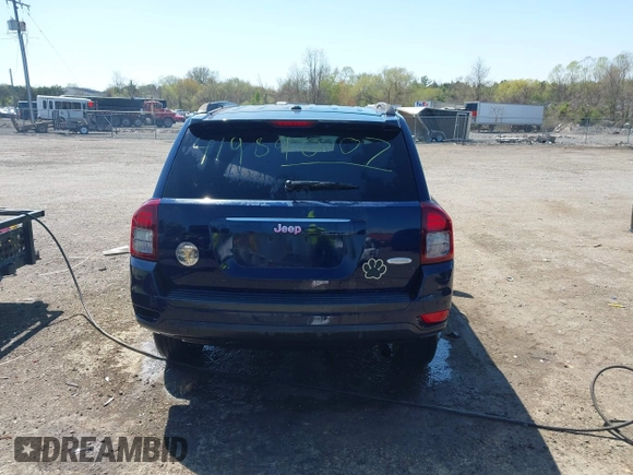 2014 Jeep Compass Latitude with VIN 1C4NJCEB2ED883243, listed as a IAAI auction lot 41989007 with 138,192 mi miles. Bid and sale history available at carsss.com. Image 17.