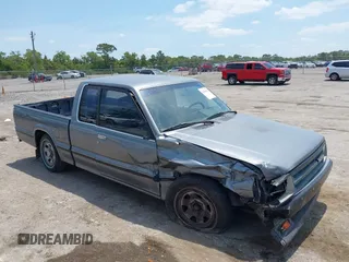 1992 Mazda B-Series Truck with VIN JM2UF313XN0306779, listed as a IAAI auction lot 42104583 with 137,826 mi miles and . Bid and sale history available at DreamBid. Image 1.