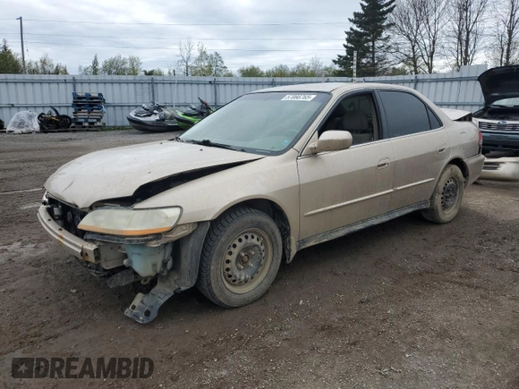 2001 Honda Accord LX z VIN 1HGCG56471A806768, wystawiony jako Copart lot #57066765 z przebiegiem 166 743 mil mil oraz Czysty tytuł • Clean title. Historia ofert i sprzedaży dostępna na DreamBid. Obrazek 1.