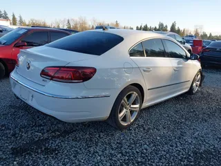 2014 Volkswagen CC Sport with VIN WVWAP7AN1EE540051, listed as a IAAI auction lot 41381933 with 54,896 mi miles. Bid and sale history available at carsss.com. Image 4.