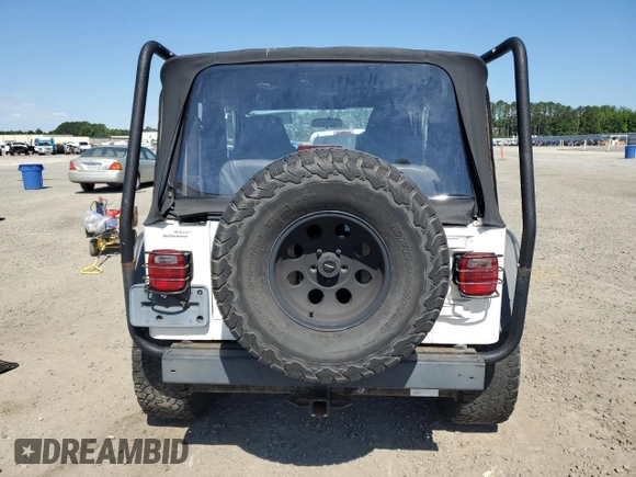 2003 Jeep Wrangler X with VIN 1J4FA39S13P311214, listed as a Copart auction lot 57345175 with 75,088 mi miles and Salvage title. Bid and sale history available at DreamBid. Image 6.
