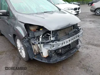 2018 Ford C-Max SE z VIN 1FADP5AU4JL100846, wystawiony jako IAAI lot #42307229 z przebiegiem 66 076 mil mil oraz . Historia ofert i sprzedaży dostępna na DreamBid. Obrazek 6.