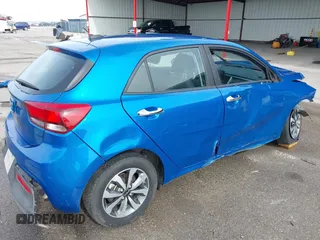 2023 Kia Rio S with VIN 3KPA25AD4PE558982, listed as a IAAI auction lot 41338270 with 40,965 mi miles and . Bid and sale history available at DreamBid. Image 4.