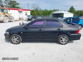 2002 Mitsubishi Lancer OZ-Rally with VIN JA3AJ86E22U074890, listed as a IAAI auction lot 42029591 with 235,818 mi miles. Bid and sale history available at carsss.com. Image 14.