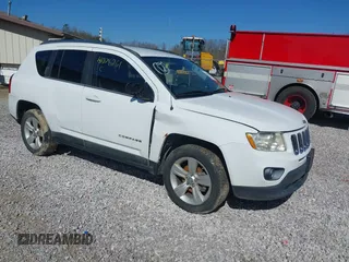 2011 Jeep Compass with VIN 1J4NF1FB7BD197404, listed as a IAAI auction lot 41876261 with 150,891 mi miles. Bid and sale history available at carsss.com. Image 1.
