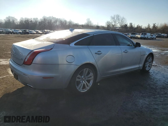2013 Jaguar XJ Portfolio with VIN SAJWJ2GD3D8V47266, listed as a Copart auction lot 46824695 with 157,151 mi miles and Salvage title. Bid and sale history available at DreamBid. Image 3.