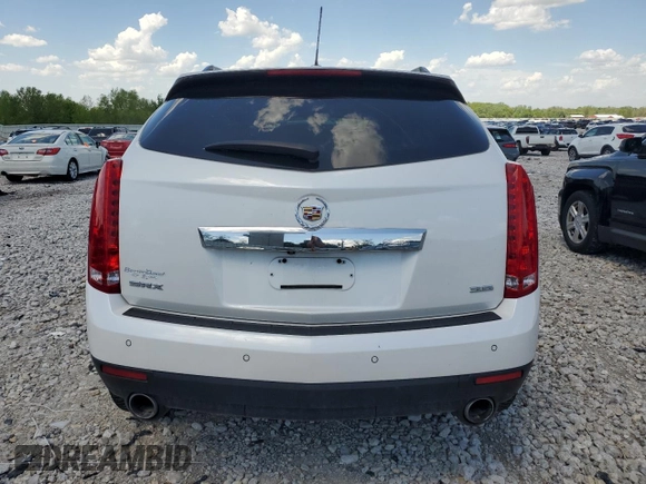 2016 Cadillac SRX Luxury Collection z VIN 3GYFNBE34GS505188, wystawiony jako Copart lot #56690805 z przebiegiem 121 935 mil mil oraz Czysty tytuł • Clean title. Historia ofert i sprzedaży dostępna na DreamBid. Obrazek 6.