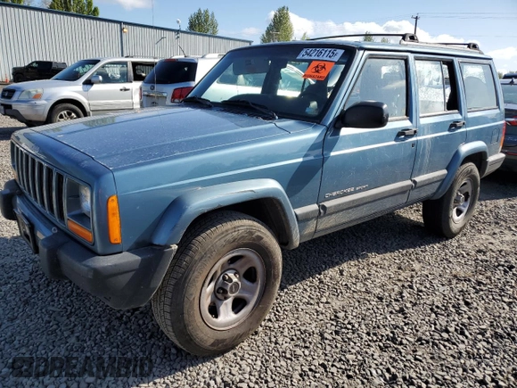 1999 Jeep Cherokee Sport with VIN 1J4FT68S1XL577603, listed as a Copart auction lot 54216115 with 180,128 mi miles and Salvage title. Bid and sale history available at DreamBid. Image 1.