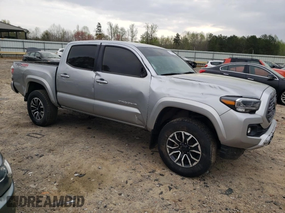 2023 Toyota Tacoma 4WD SR with VIN 3TMCZ5AN8PM535918, listed as a Copart auction lot 51680295 with 60,012 mi miles and Salvage Title. Bid and sale history available at carsss.com. Image 4.