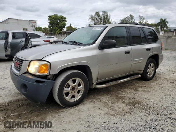 2005 GMC Envoy SLT with VIN 1GKDS13S352101385, listed as a Copart auction lot 89271025 with 165,670 mi miles and Salvage Title. Bid and sale history available at carsss.com. Image 1.