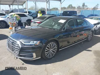 2019 Audi A8 z VIN WAU8DAF83KN006534, wystawiony jako IAAI lot #41712610 z przebiegiem 52 263 mil mil oraz . Historia ofert i sprzedaży dostępna na DreamBid. Obrazek 2.