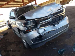 2020 Chevrolet Tahoe LT with VIN 1GNSKBKC6LR259394, listed as a IAAI auction lot 41872784 with 124,020 mi miles and . Bid and sale history available at DreamBid. Image 1.