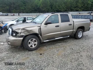 2006 Dodge Dakota SLT z VIN 1D7HE48N66S641149, wystawiony jako Copart lot #58823615 z przebiegiem 169 002 mil mil oraz Szkoda całkowita • Salvage title. Historia ofert i sprzedaży dostępna na DreamBid. Obrazek 1.