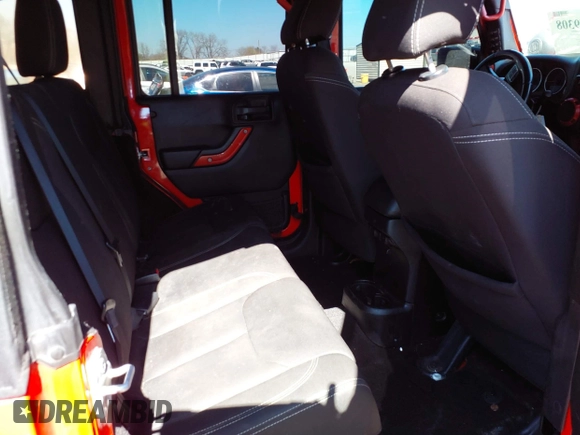 2015 Jeep Wrangler Unlimited Sahara with VIN 1C4BJWEG1FL748732, listed as a IAAI auction lot 41779308 with 109,986 mi miles. Bid and sale history available at carsss.com. Image 8.