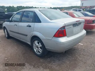 2005 Ford Focus S с VIN 1FAFP34N95W101125, выставлен на аукционе IAAI как лот 42647066 с пробегом 343 586 миль миль и . История ставок и продаж доступна на DreamBid. Изображение 3.