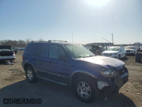 2006 Ford Escape XLT with VIN 1FMYU93136KA51162, listed as a Copart auction lot 52239385 with 227,666 mi miles and Salvage title. Bid and sale history available at DreamBid. Image 4.