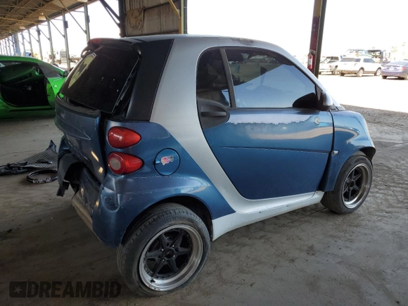 2010 Smart fortwo Pure с VIN WMEEJ3BA1AK360041, выставлен на аукционе Copart как лот 59594055 с пробегом Не указан миль и Списание • Salvage title. История ставок и продаж доступна на DreamBid. Изображение 3.