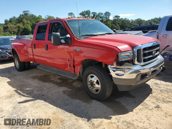 2003 Ford F-350 XL with VIN 1FTWW33P63EC65547, listed as a Copart auction lot 73002754 with 184,482 mi miles and Salvage Title. Bid and sale history available at DreamBid. Image 4.