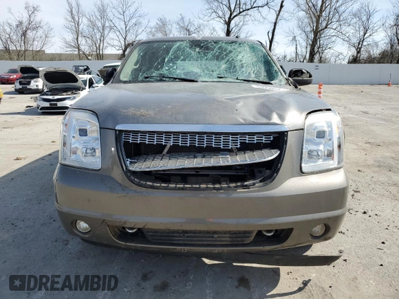 2007 GMC Yukon SLT with VIN 1GKFK13027J130960, listed as a Copart auction lot 49958035 with 0 mi miles and Salvage Title. Bid and sale history available at carsss.com. Image 5.