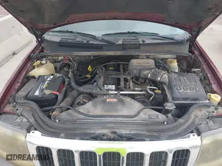 2003 Jeep Grand Cherokee Laredo with VIN 1J4GW48S83C563627, listed as a IAAI auction lot 41910225 with 150,264 mi miles. Bid and sale history available at carsss.com. Image 10.