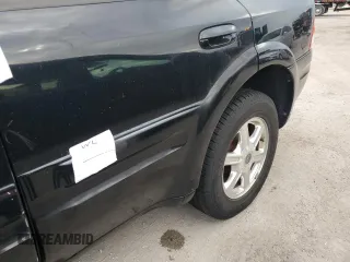 2003 Oldsmobile Bravada z VIN 1GHDT13S632357164, wystawiony jako Copart lot #75089244 z przebiegiem Nie podano mil oraz Szkody całkowita. Historia ofert i sprzedaży dostępna na DreamBid. Obrazek 13.
