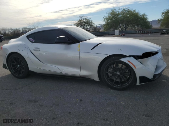 2023 Toyota GR Supra 3.0 with VIN WZ1DB0G00PW055929, listed as a Copart auction lot 76407574 with 16,889 mi miles and Salvage Title. Bid and sale history available at carsss.com. Image 4.