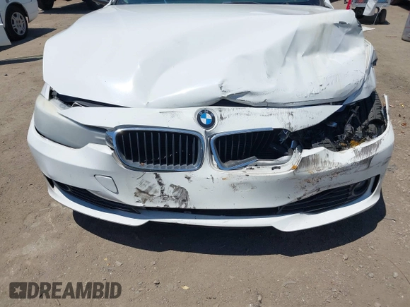 2014 BMW 3 Series 328i with VIN WBA3A5G55ENP31569, listed as a IAAI auction lot 42218428 with 151,927 mi miles and . Bid and sale history available at DreamBid. Image 6.
