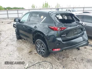 2018 Mazda CX-5 Grand Touring z VIN JM3KFADM8J0325157, wystawiony jako IAAI lot #42214750 z przebiegiem Nie podano mil oraz . Historia ofert i sprzedaży dostępna na DreamBid. Obrazek 3.