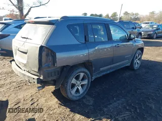 2016 Jeep Compass Latitude with VIN 1C4NJDEB7GD746114, listed as a IAAI auction lot 41571587 with 112,645 mi miles. Bid and sale history available at carsss.com. Image 4.
