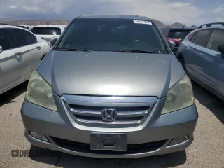 2005 Honda Odyssey Touring z VIN 5FNRL38805B131416, wystawiony jako Copart lot #59157395 z przebiegiem 263 087 mil mil oraz Szkoda całkowita • Salvage title. Historia ofert i sprzedaży dostępna na DreamBid. Obrazek 5.