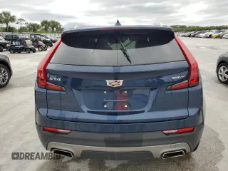 2021 Cadillac XT4 FWD Premium Luxury z VIN 1GYFZCR48MF056210, wystawiony jako Copart lot #45818245 z przebiegiem Nie podano mil oraz Nie do naprawy • Non repairable. Historia ofert i sprzedaży dostępna na DreamBid. Obrazek 6.
