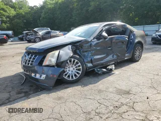 2013 Cadillac CTS Performance z VIN 1G6DK5E3XD0104466, wystawiony jako Copart lot #57479555 z przebiegiem Nie podano mil oraz Szkody całkowita. Historia ofert i sprzedaży dostępna na DreamBid. Obrazek 1.