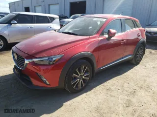 2016 Mazda CX-3 Grand Touring with VIN JM1DKBD7XG0124043, listed as a Copart auction lot 71905122 with 100,108 mi miles. Bid and sale history available at carsss.com. Image 1.