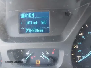 2015 Ford Transit Cargo z VIN 1FTNR1ZM1FKA46909, wystawiony jako IAAI lot #42092389 z przebiegiem 216 806 mil mil oraz . Historia ofert i sprzedaży dostępna na DreamBid. Obrazek 15.