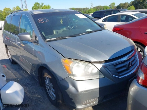 2009 Honda Odyssey EX-L with VIN 5FNRL38609B042336, listed as a IAAI auction lot 41960713 with 212,334 mi miles. Bid and sale history available at carsss.com. Image 1.