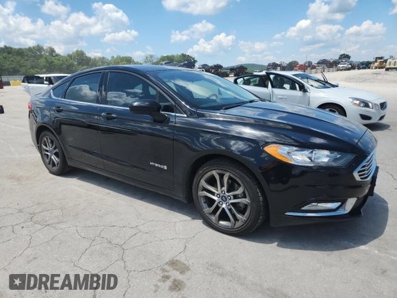 2017 Ford Fusion Hybrid SE with VIN 3FA6P0LU9HR356534, listed as a Copart auction lot 63660315 with 121,195 mi miles and Clean title. Bid and sale history available at DreamBid. Image 4.