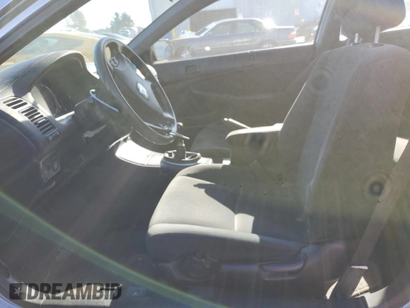 2003 Honda Civic LX with VIN 1HGEM21563L065861, listed as a Copart auction lot 41876845 with 233,101 mi miles and Salvage Title. Bid and sale history available at DreamBid. Image 7.