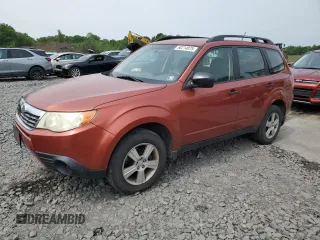 2010 Subaru Forester X with VIN JF2SH6BC3AH907454, listed as a Copart auction lot 60214875 with 118,614 mi miles and Salvage title. Bid and sale history available at DreamBid. Image 1.