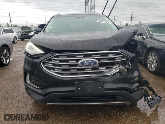 2020 Ford Edge Titanium with VIN 2FMPK4K97LBA16335, listed as a Copart auction lot 59462835 with 89,376 mi miles and Salvage title. Bid and sale history available at DreamBid. Image 5.