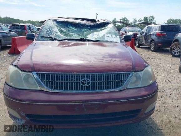 2001 Toyota Avalon XL z VIN 4T1BF28B61U144974, wystawiony jako IAAI lot #42112377 z przebiegiem 168 311 mil mil oraz . Historia ofert i sprzedaży dostępna na DreamBid. Obrazek 13.