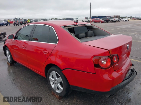2009 Volkswagen Jetta Sedan SE with VIN 3VWRM71K99M123288, listed as a IAAI auction lot 41892948 with 345,159 mi miles. Bid and sale history available at carsss.com. Image 3.