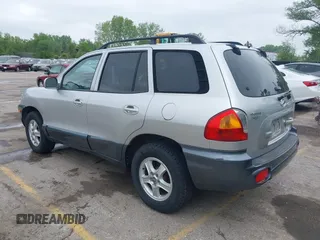 2002 Hyundai Santa Fe GLS with VIN KM8SC73D42U152166, listed as a IAAI auction lot 42088109 with 199,051 mi miles. Bid and sale history available at carsss.com. Image 3.