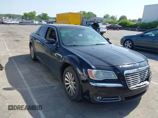 2014 Chrysler 300 with VIN 2C3CCAAG4EH252864, listed as a IAAI auction lot 42056787 with 185,063 mi miles. Bid and sale history available at carsss.com. Image 1.