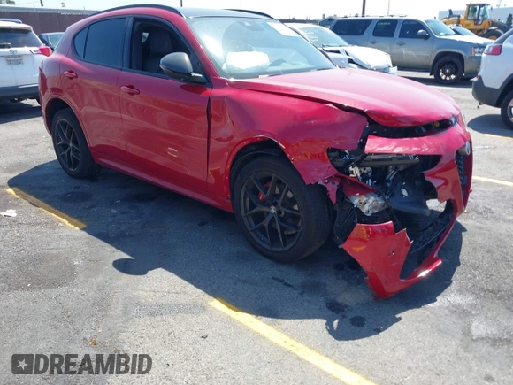 2020 Alfa Romeo Stelvio Ti z VIN ZASPAKBN5L7C73874, wystawiony jako IAAI lot #41996616 z przebiegiem Nie podano mil oraz . Historia ofert i sprzedaży dostępna na DreamBid. Obrazek 1.