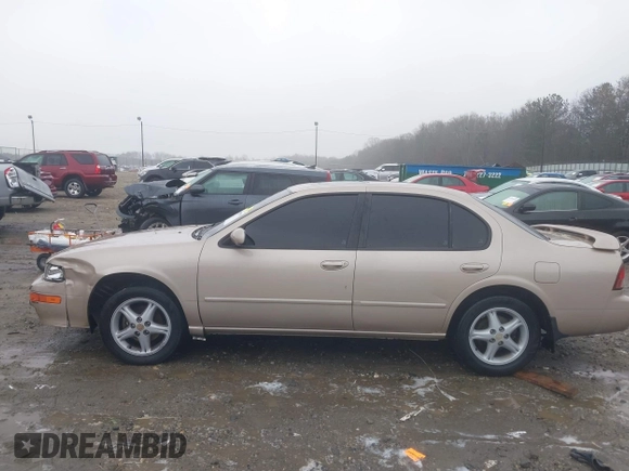 1998 Nissan Maxima GXE with VIN JN1CA21D6WM923286, listed as a IAAI auction lot 41555099 with 134,005 mi miles and . Bid and sale history available at DreamBid. Image 14.