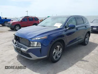 2021 Hyundai Santa Fe SE with VIN 5NMS14AJ2MH339403, listed as a IAAI auction lot 42024896 with 91,734 mi miles and . Bid and sale history available at DreamBid. Image 2.